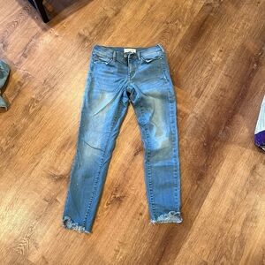 Distressed light wash jeans
